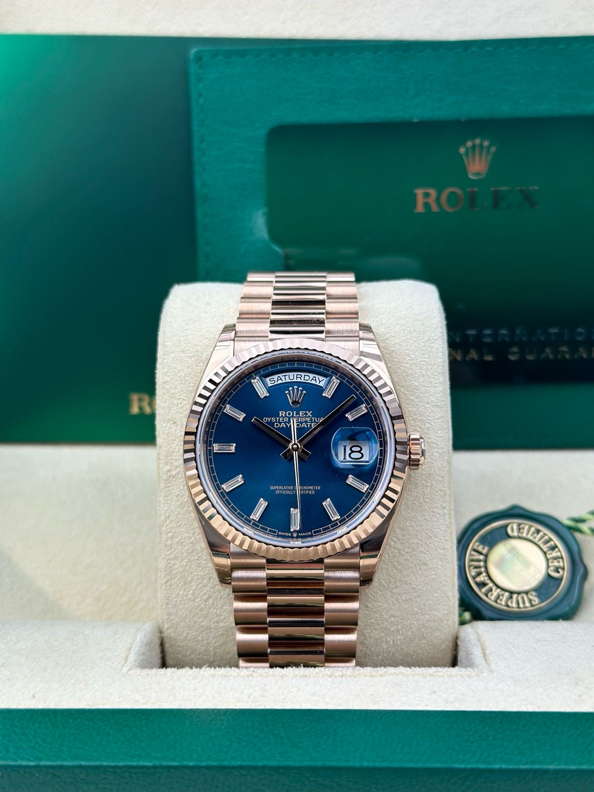 Rolex Day Date 36mm Rose Gold Blue Baguette Dial 128235