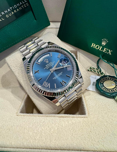 Rolex Day-Date 40, Oyster, 40mm, White Gold, Blue Roman dial, Fluted bezel, President Bracelet, ref 228239