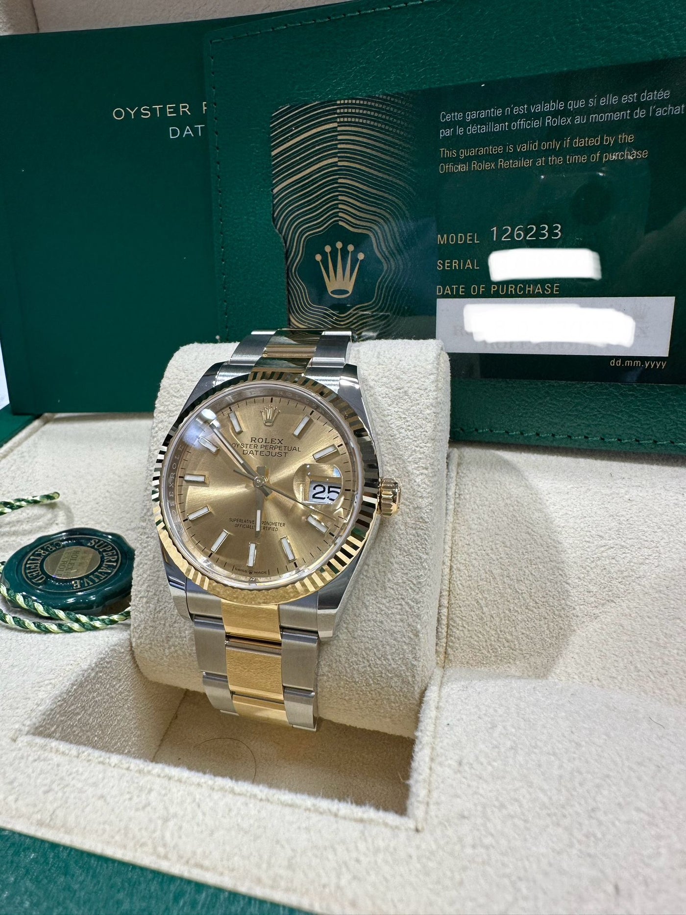 Rolex  Datejust 36, Oyster, 36 mm, Oystersteel and yellow gold features,  Champagne-colour dial, oyster bracelet, 126233
